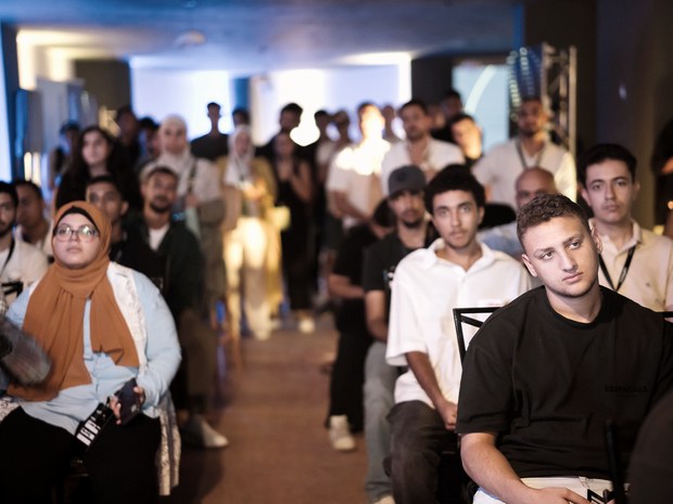 A gathering filling the campus hall